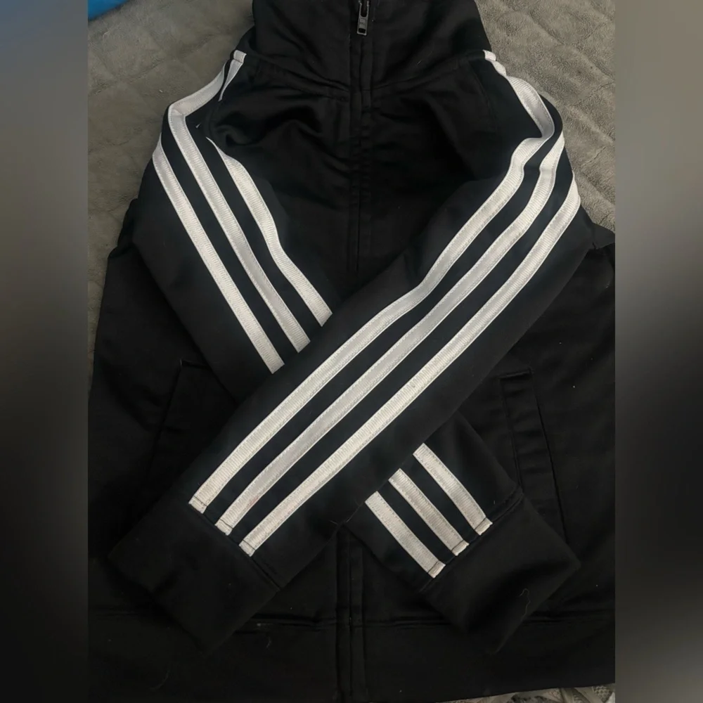 Trendy Adidas Kids Black Track Jacket with Iconic White Adidas Stripes | Size XS